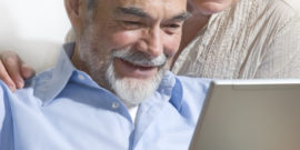 Senior couple on laptop